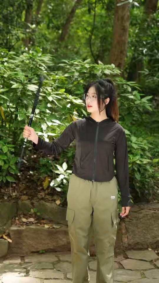 Person demonstrating a telescopic trekking pole outdoors in Seawing's Facebook Reel