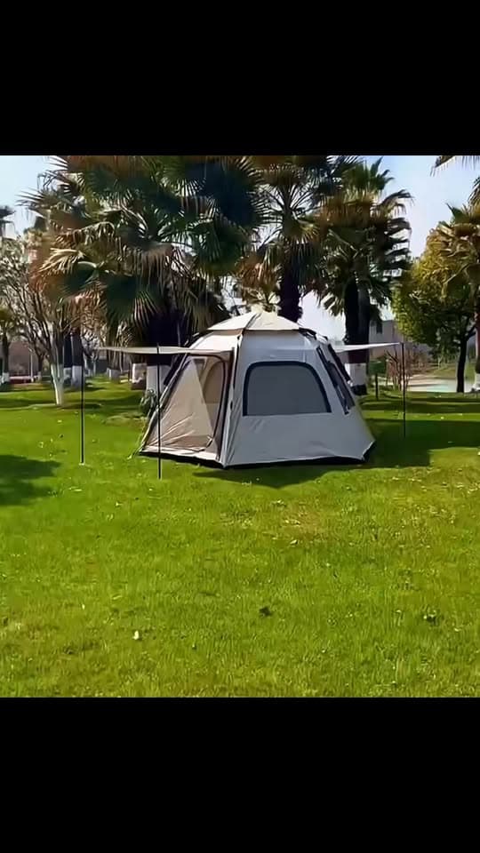 Large light-coloured tent with an extended canopy set up outdoors in Seawing's Facebook Reel