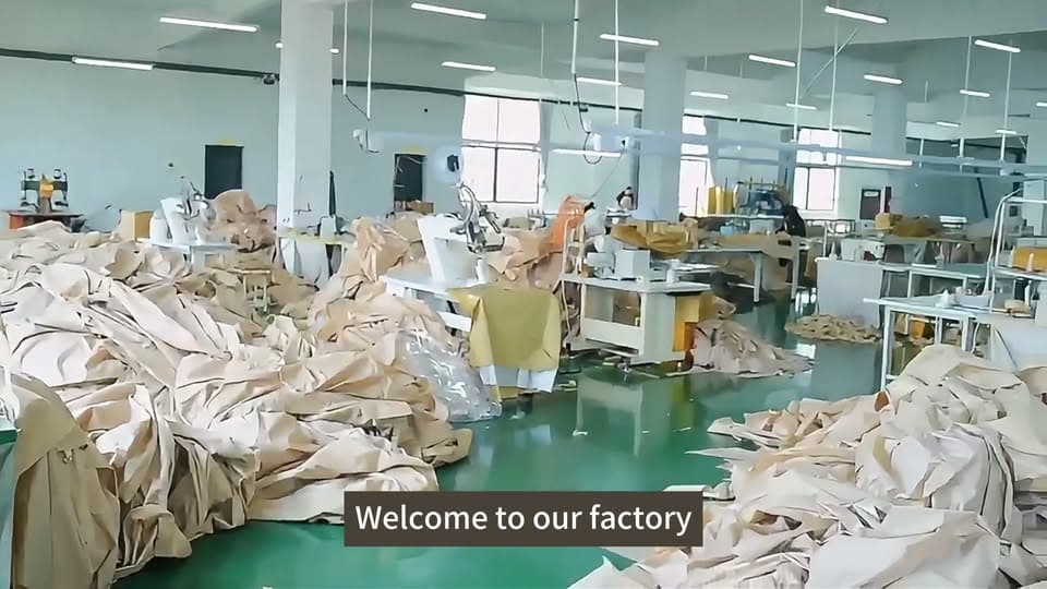 Wide view of tent-fabric panels and sewing stations shown in Seawing's Facebook Reel